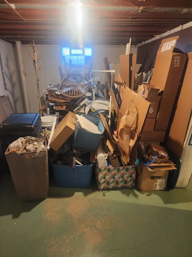 Roll-off dumpster container at job site for 2 Yard Dumpster Rental in Beekmantown